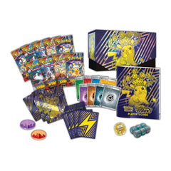 Pokémon trading card game set with cards, dice, and player's guide on a white background