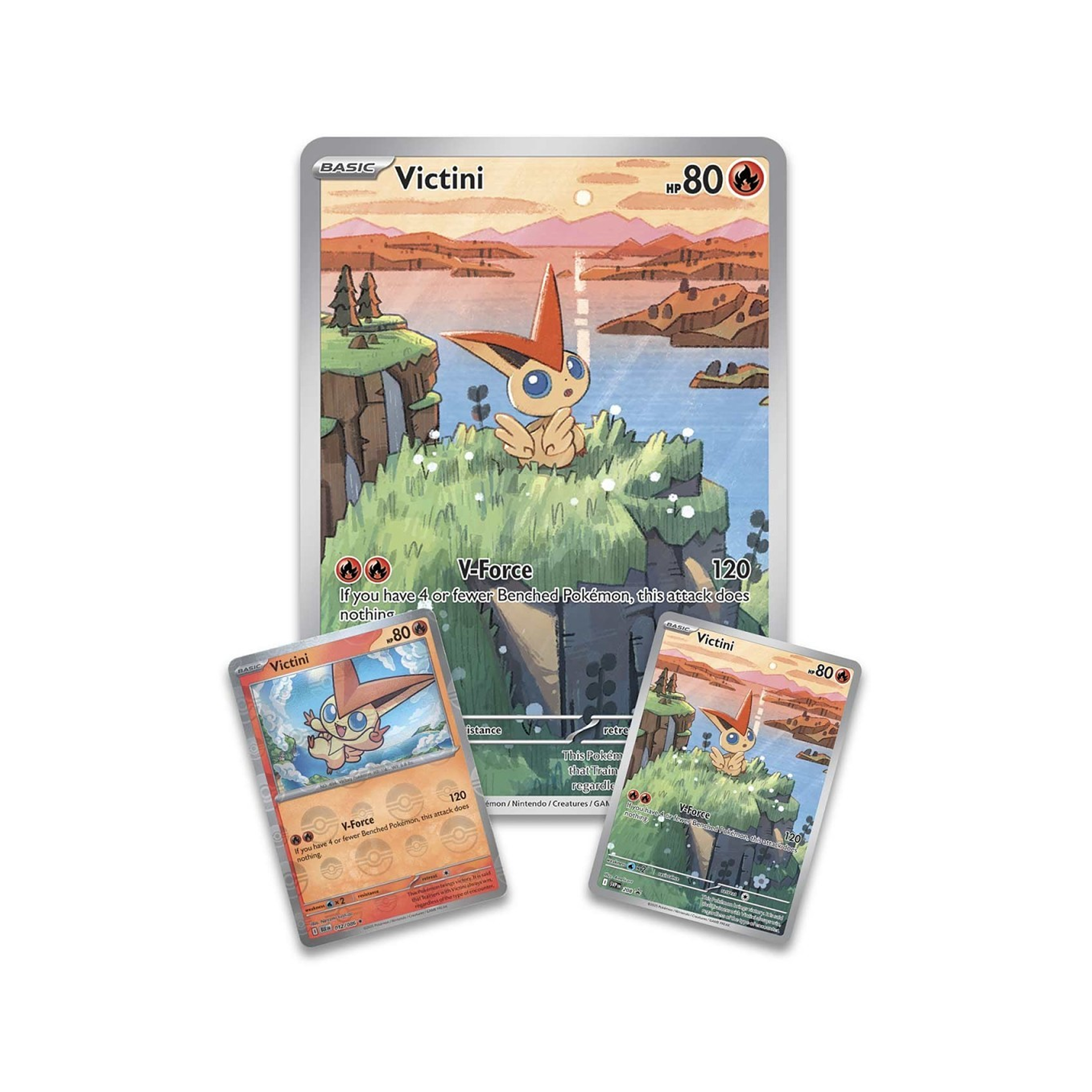 Three Victini trading cards from a trading card game on a white background