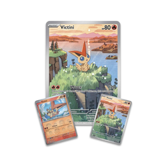 Three Victini trading cards from a trading card game on a white background
